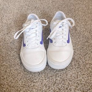 Vans with a purple stripe